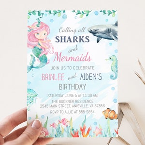 May include: A blue and green watercolour invitation with a mermaid and a shark. The text reads "Calling all Sharks and Mermaids. Join us to celebrate Brinlee and Aiden's Birthday. Saturday, June 5 at 11:30 AM. The Buckner Residence, 2545 Main Street, Anisville, VA 87856. RSVP to Allie at 555-9854."