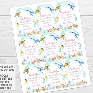 May include: Nine printable thank you tags featuring an underwater theme. Each tag has a light blue background with white polka dots and a watercolor illustration of a sea turtle, a seahorse, and a whale. The text on each tag reads "Thank You for celebrating under the sea with me! Love, Aria."