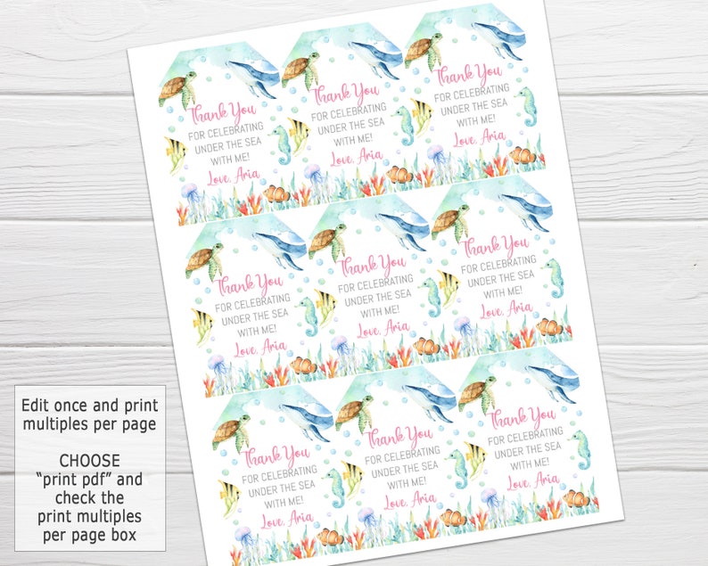 May include: Nine printable thank you tags featuring an underwater theme. Each tag has a light blue background with white polka dots and a watercolor illustration of a sea turtle, a seahorse, and a whale. The text on each tag reads "Thank You for celebrating under the sea with me! Love, Aria."