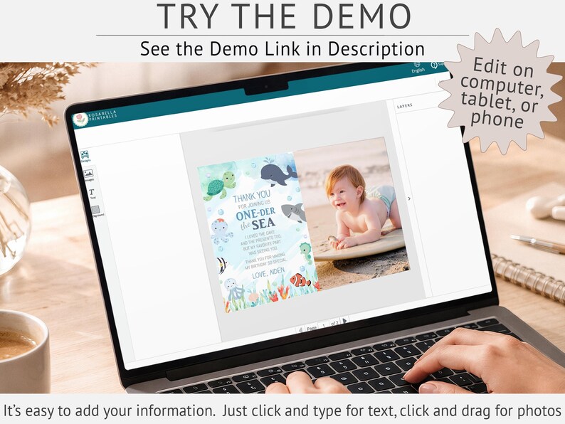 a laptop screen displaying a customizable baby shower invitation design. The invitation features a photo of a baby and includes text that says "Thank you for joining us for our one-of-a-kind baby shower. We are so excited to share our love for our baby with you!" The laptop is placed on a wooden table, and there is a cup and a pen nearby.