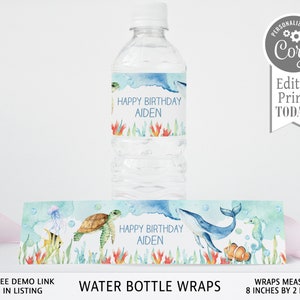 May include: Water bottle labels with an under the sea theme. The labels feature a whale, seahorse, turtle, and jellyfish. The labels are personalized with the text "Happy Birthday Aiden". The labels measure 8 inches by 2 inches.