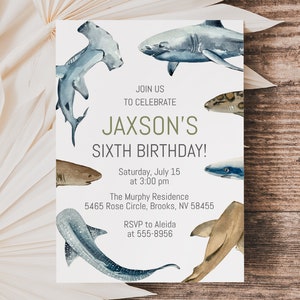 May include: A white invitation with a green and brown title that reads "Jaxson's Sixth Birthday!"  The invitation features watercolor illustrations of various sharks, including a hammerhead, a great white, and a reef shark. The invitation includes the date, time, and location of the party.