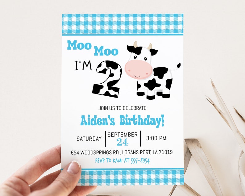 May include: A blue and white gingham birthday invitation featuring a cartoon cow and the text "Moo Moo I'm 2" and "Aiden's Birthday!" The invitation includes the date, time, and location of the party.