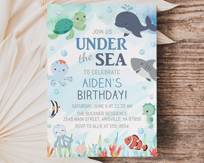 May include: Under the Sea birthday party invitation with a blue, green, and orange watercolor background. The invitation features a variety of sea creatures, including a turtle, octopus, whale, shark, seahorse, jellyfish, and clownfish. The text on the invitation reads "Join us Under the Sea to celebrate Aiden's Birthday!"  Saturday, June 5 at 11:30 AM. The Buckner Residence, 2545 Main Street, Anisville, VA 87856. RSVP to Allie at 555-9854.