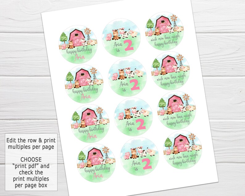 May include: A set of 8 round printable stickers featuring a watercolor illustration of a red barn, farm animals, and the text "happy birthday Aria" with a pink number 2. The stickers are designed for a farm-themed birthday party.
