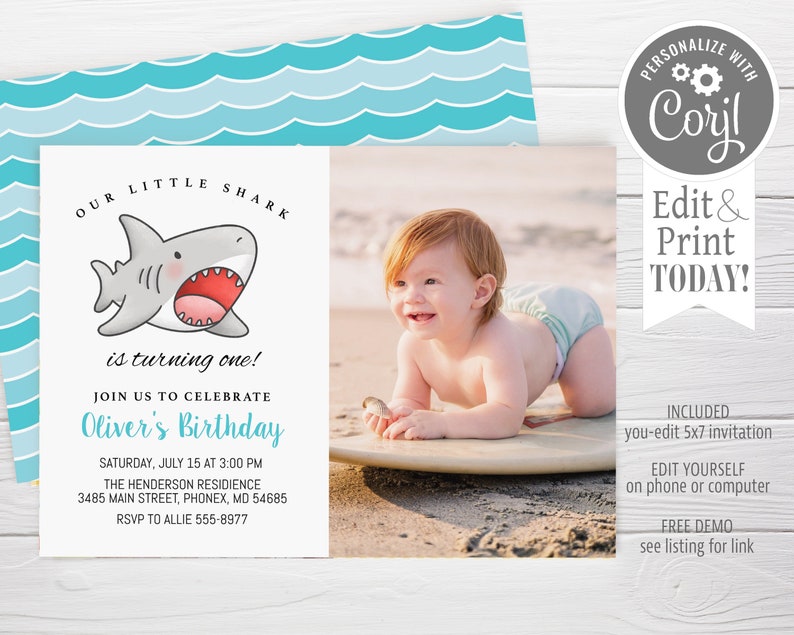 May include: A blue and white invitation for a baby's first birthday party. The invitation features a cartoon shark and the text "Our Little Shark is turning one!"  Join us to celebrate Oliver's Birthday. Saturday, July 15 at 3:00 PM. The Henderson Residence, 3485 Main Street, Phonex, MD 54685. RSVP to Allie 555-8977.