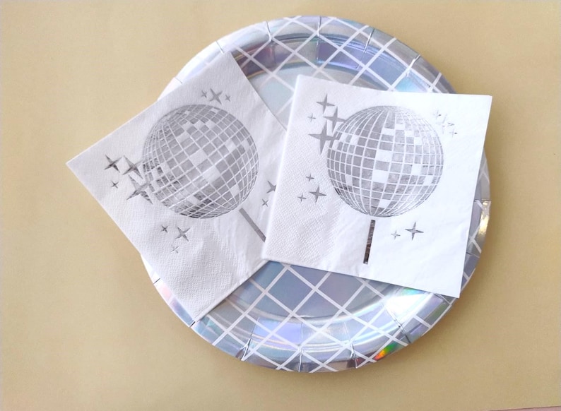 disco ball napkins
retro party decor
bride tribe party
fun party napkins
shiny party supplies
disco theme event
foil printed napkins
disco bachelorette
sparkly party table
last disco theme
party napkin set
unique party details
disco bridal bash
wedding napkins fun
70s disco party vibes