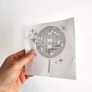 disco ball napkins
retro party decor
bride tribe party
fun party napkins
shiny party supplies
disco theme event
foil printed napkins
disco bachelorette
sparkly party table
last disco theme
party napkin set
unique party details
disco bridal bash
wedding napkins fun
70s disco party vibes