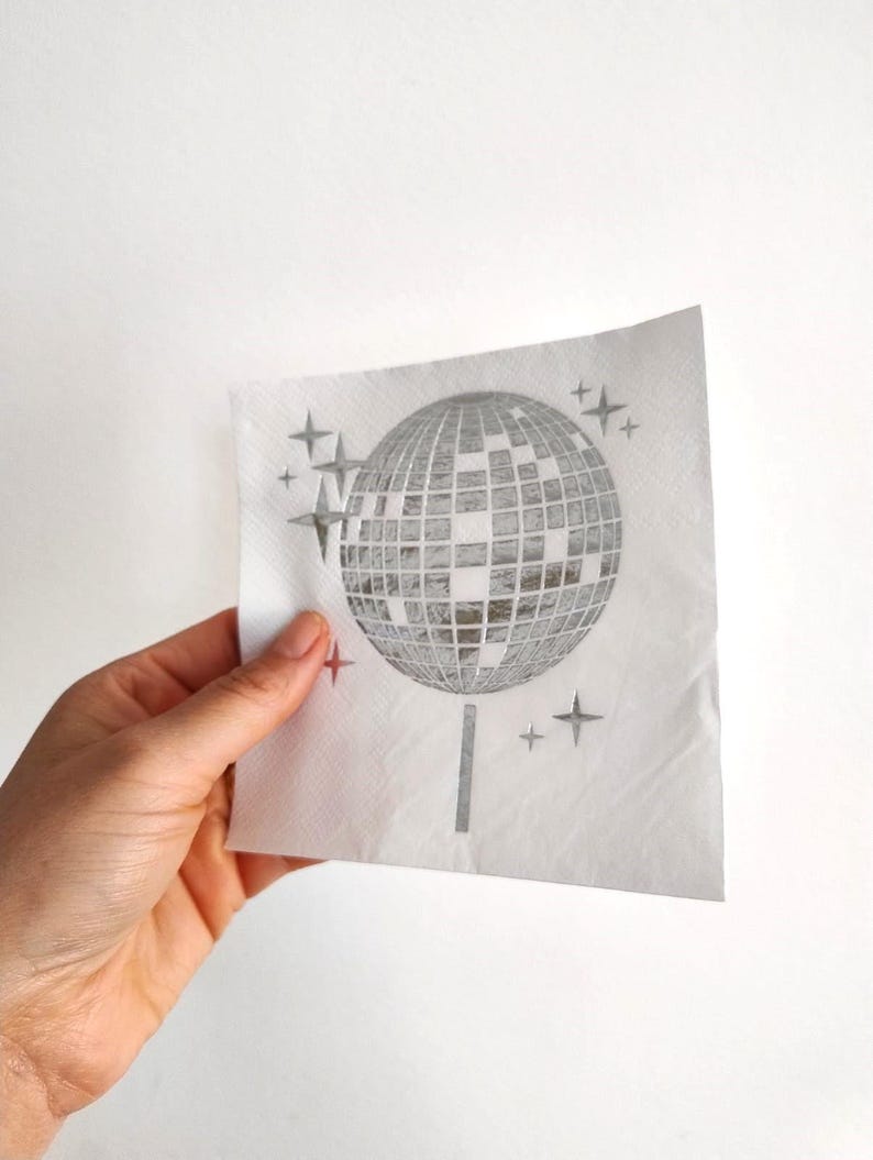 disco ball napkins
retro party decor
bride tribe party
fun party napkins
shiny party supplies
disco theme event
foil printed napkins
disco bachelorette
sparkly party table
last disco theme
party napkin set
unique party details
disco bridal bash
wedding napkins fun
70s disco party vibes