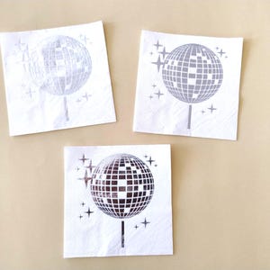 disco ball napkins
retro party decor
bride tribe party
fun party napkins
shiny party supplies
disco theme event
foil printed napkins
disco bachelorette
sparkly party table
last disco theme
party napkin set
unique party details
disco bridal bash
wedding napkins fun
70s disco party vibes