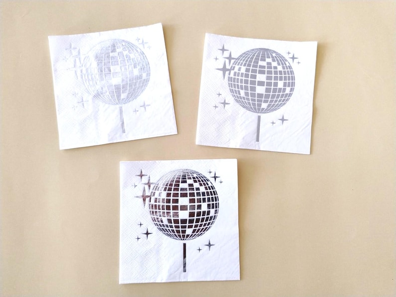 disco ball napkins
retro party decor
bride tribe party
fun party napkins
shiny party supplies
disco theme event
foil printed napkins
disco bachelorette
sparkly party table
last disco theme
party napkin set
unique party details
disco bridal bash
wedding napkins fun
70s disco party vibes