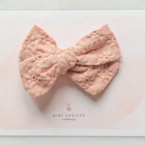 Burnt orange floral cotton baby hair bows, ginger baby bow , newborn bow, girl bow, pinwheel bow, baby headband, nylon hair bow, floral bow