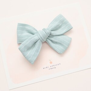 BLUE PINSTRIPE baby hair bow, blue stripe baby bow , newborn bow, girl bow, pinwheel bow, baby headband, toddler bow, striped hair bow