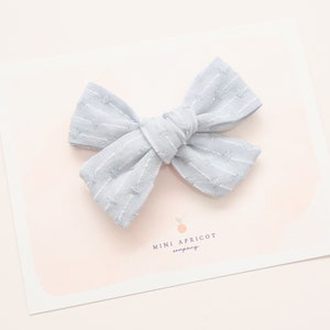 NEW** BLUE STRIPED Swiss dot hair bow, blush baby bow , newborn bow, girl bow, pinwheel bow, baby headband, nylon hair bow, striped hair bow