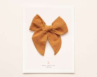 BURNT ORANGE FABLE hair bow, orange baby bow , newborn bow, girl bow, fable bow, baby headband, nylon hair bow, knotted bow, linen hair bow