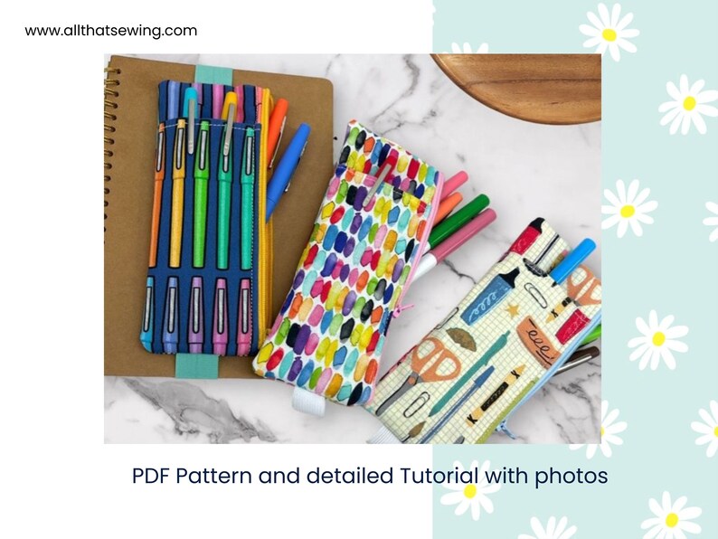 May include: Three colorful zippered pencil pouches with different patterns. The pouches are filled with pens and pencils. The pouches are on a white surface.