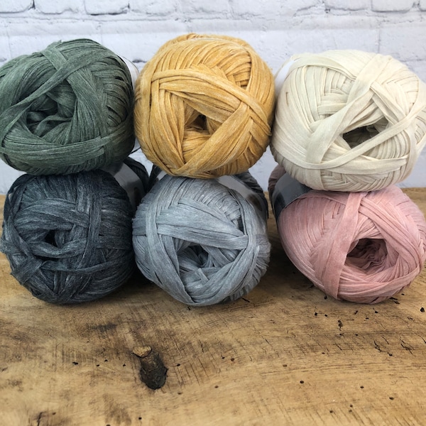 Lion Brand Rewind Tape Yarn that is a polyester/viscose blend fiber which is great for baskets, home decor, fashion and many accessories.