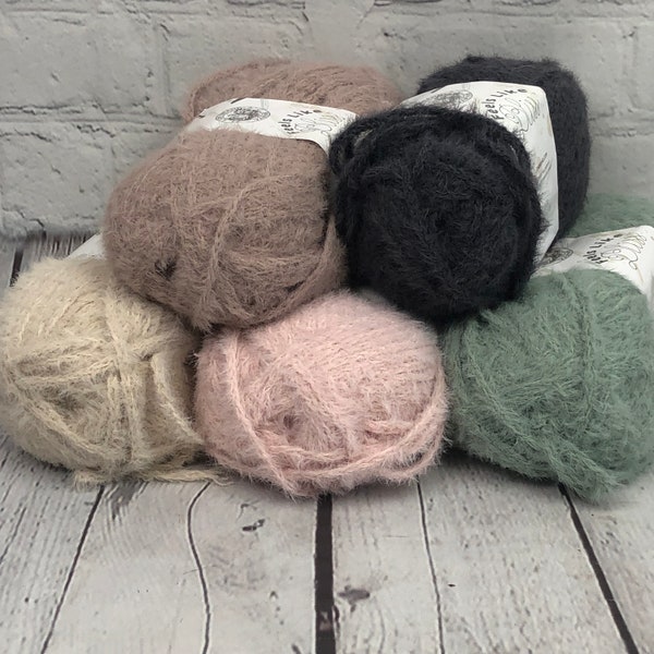 Lion Brand Feels Like Bliss is a fuzzy, nylon Bulky yarn that is a warm fiber for hats, baby or home decor items.