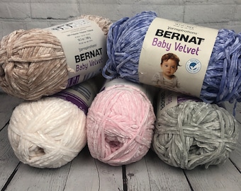 Bernat Baby Velvet yarn is a soft, worsted weight, chenille yarn that is baby safe used for blankets, plush toys and baby accessories.