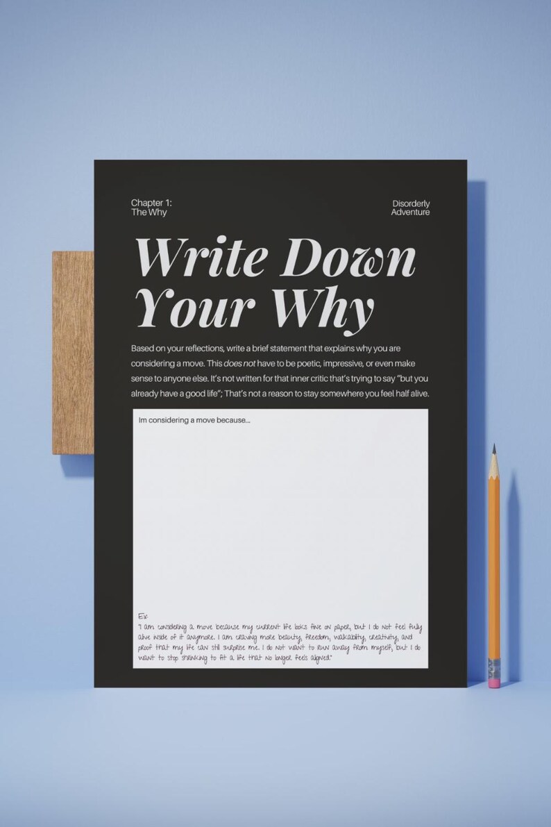 May include: A black rectangular worksheet titled Chapter 1: The Why, Write Down Your Why, featuring a white text block with instructions, a large blank white space for writing, and a sample paragraph at the bottom, accompanied by a yellow pencil.