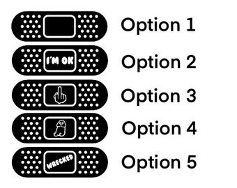 May include: Five black and white band-aid style stickers with different phrases and images. The phrases include "I'm OK", "Wrecked", and an image of a middle finger.