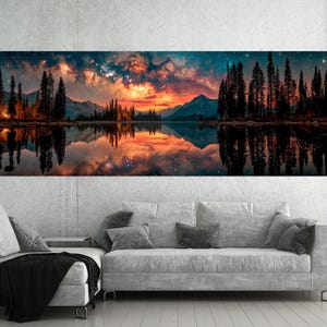 May include: A panoramic canvas print showing a tranquil lake scene at dusk. The artwork features a vibrant sunset with orange and yellow hues, reflected in the calm water. Silhouetted trees and mountains frame the scene, creating a peaceful landscape.
