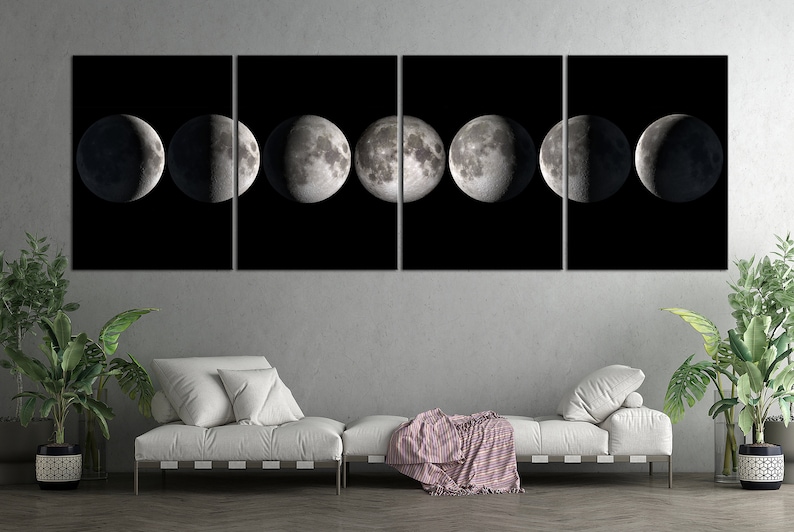 May include: A black and white canvas print of the moon in eight different phases. The moon is depicted in a circular shape with a dark background.