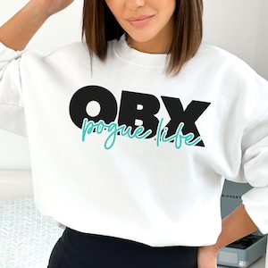 OBX sweatshirt, pogue life crewneck, obx gift, outer banks north carolina sweatshirt, outer banks paradise on earth sweatshirt, poguelandia