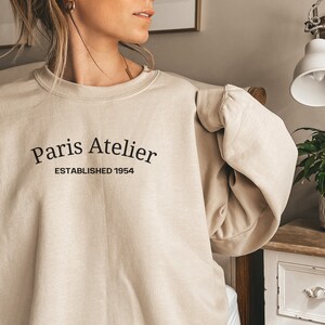 paris atelier crewneck, vogue style sweatshirt, paris crewneck, vogue paris shirt, eiffel tower, paris apparel for women, france crewneck