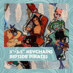May include: Keychains featuring colorful illustrations of pirate characters. The keychains are 3 to 3.5 inches in size and have red or pink clasps. The text "3"-3.5" KEYCHAINS RIPTIDE PIRATES" is printed on the image.