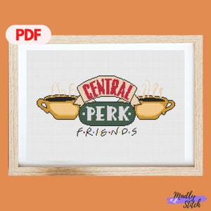 May include: Cross stitch pattern featuring the Central Perk logo from the TV show Friends. The logo is a green rectangle with the words "Central Perk" in white and "FRIENDS" in small white letters below. There are three yellow coffee cups with steam coming from them.