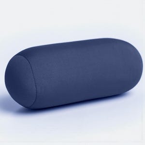 May include: A navy blue cylindrical bolster pillow. The pillow has rounded ends and a smooth, solid color fabric. The pillow is designed for comfort and support, and is suitable for use on a bed or sofa.