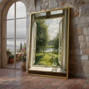 May include: A framed artwork depicts an open window overlooking a serene landscape. The painting features a lush green field, a river, and trees under a cloudy sky. A small vase of white flowers sits on the window sill. The frame is gold.