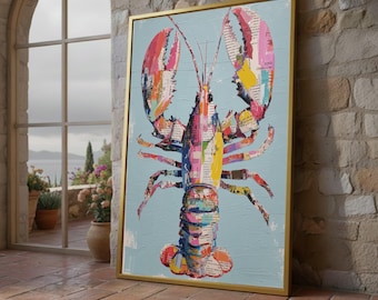 May include: A framed wall art print featuring a collage-style lobster illustration on a light blue background. The lobster is composed of various colorful paper scraps with printed text, showcasing shades of red, pink, yellow, and blue.