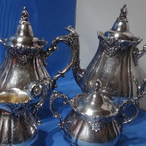 Baroque by Wallace Silver Plated Coffee Teapot Creamer Sugar Bowl Set