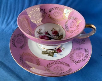 Preciosa taza y platillo de porcelana fina con diseño de rosas, fabricados en Japón.