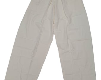 May include: A pair of off-white, lightweight pants with a drawstring waist.