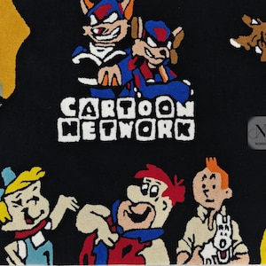 Cartoon network Plush Area Rug: Featuring Bugs Bunny, Scooby doo, Tom & Jerry and more Classic Cartoon characters! Perfect for Game rooms.