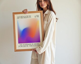 May include: A framed print with a colorful abstract design and the text "AFFIRMATION n°01 MY COURAGE IS MORE POWERFUL THEN DOUBT".