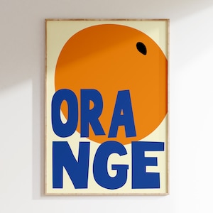 May include: A poster with a large orange circle and the word "ORANGE" in blue letters. The circle has a small black dot in the upper right corner.