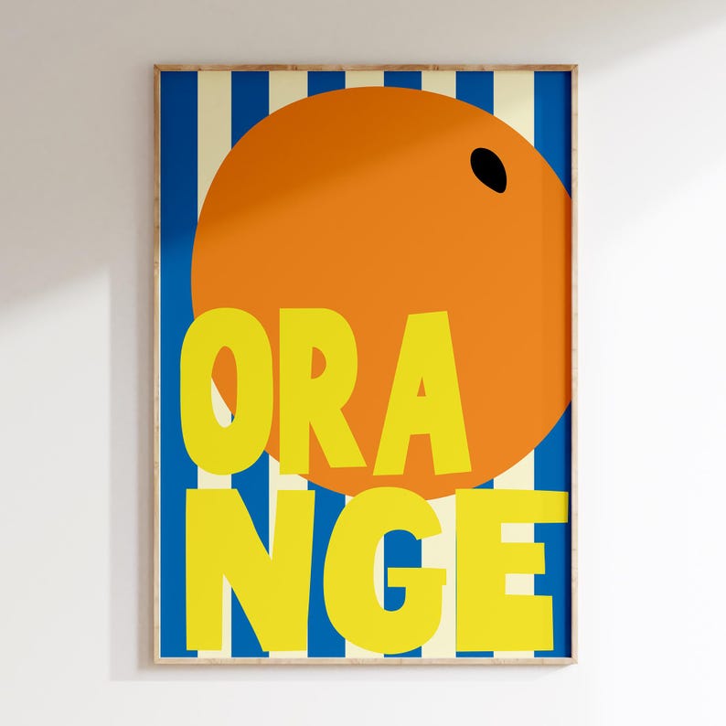 May include: A poster with a blue and white striped background. A large orange circle with a black dot is in the center of the poster. The word "ORANGE" is written in yellow letters over the orange circle.