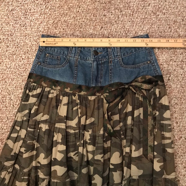 Adorable upcycled denim/jean camouflage skirt.  Machine washable.