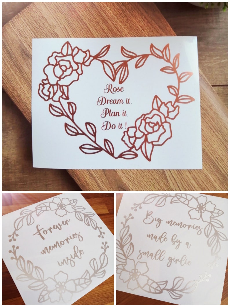 May include: Three floral designs with inspirational quotes. The first design features a rose with the text "Rose Dream it. Plan it. Do it!" The second design features a floral wreath with the text "Forever memories inside". The third design features a floral wreath with the text "Big memories made by a small girlie".