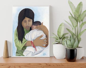 May include: A framed painting depicts a mother tenderly cradling a sleeping baby. The artwork features a woman with dark hair and a green shirt, holding the baby wrapped in white. The background is a soft blue.