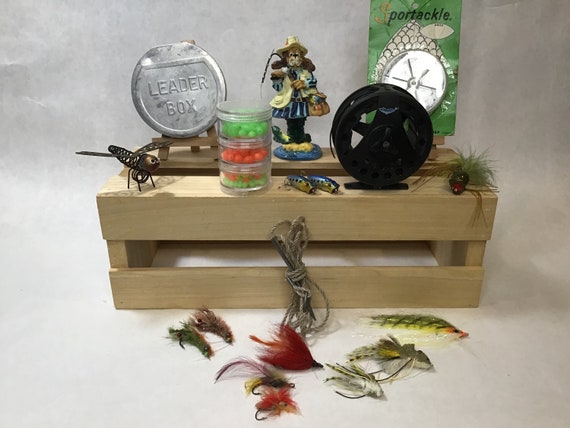 Fly Fishing Reel With a Collection of Fly Fishing Tackle 