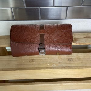 Cartera personal vintage para pescadores con mosca
