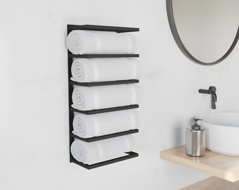 Plusieurs porte-serviettes, rangement pour les petites salles de bain, porte-serviettes