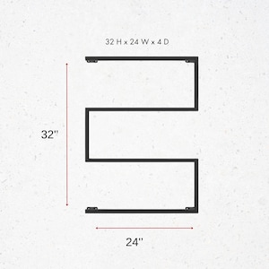 May include: Black metal wall shelf with a distinctive zig-zag design. The shelf measures 81 cm high, 61 cm wide, and 10 cm deep. The dimensions are clearly labelled on the image. The shelf has mounting brackets at each end.