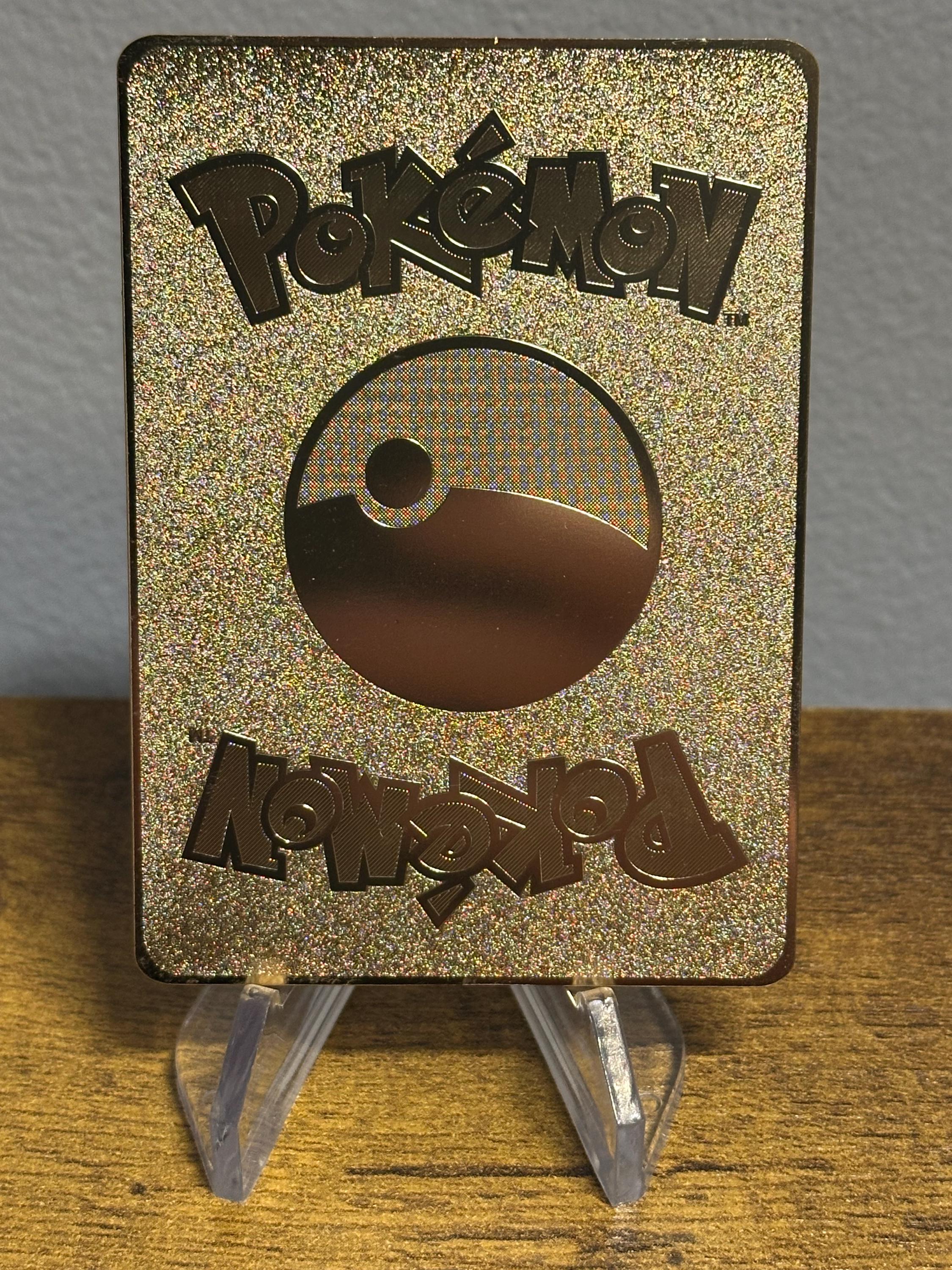 custom gold metal pokemon cards Charizard Card. We convert any debit or credit card to metal. Choose on of our designs or create your own. #charizard #pokemon #custommetalcard #blaqcard #blaqcards #photooftheday #rolex Custom Metal Pokemon Card -