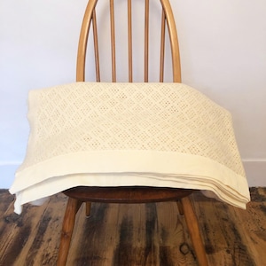 Cream-light lemon coloured Witney-type vintage honeycomb blanket